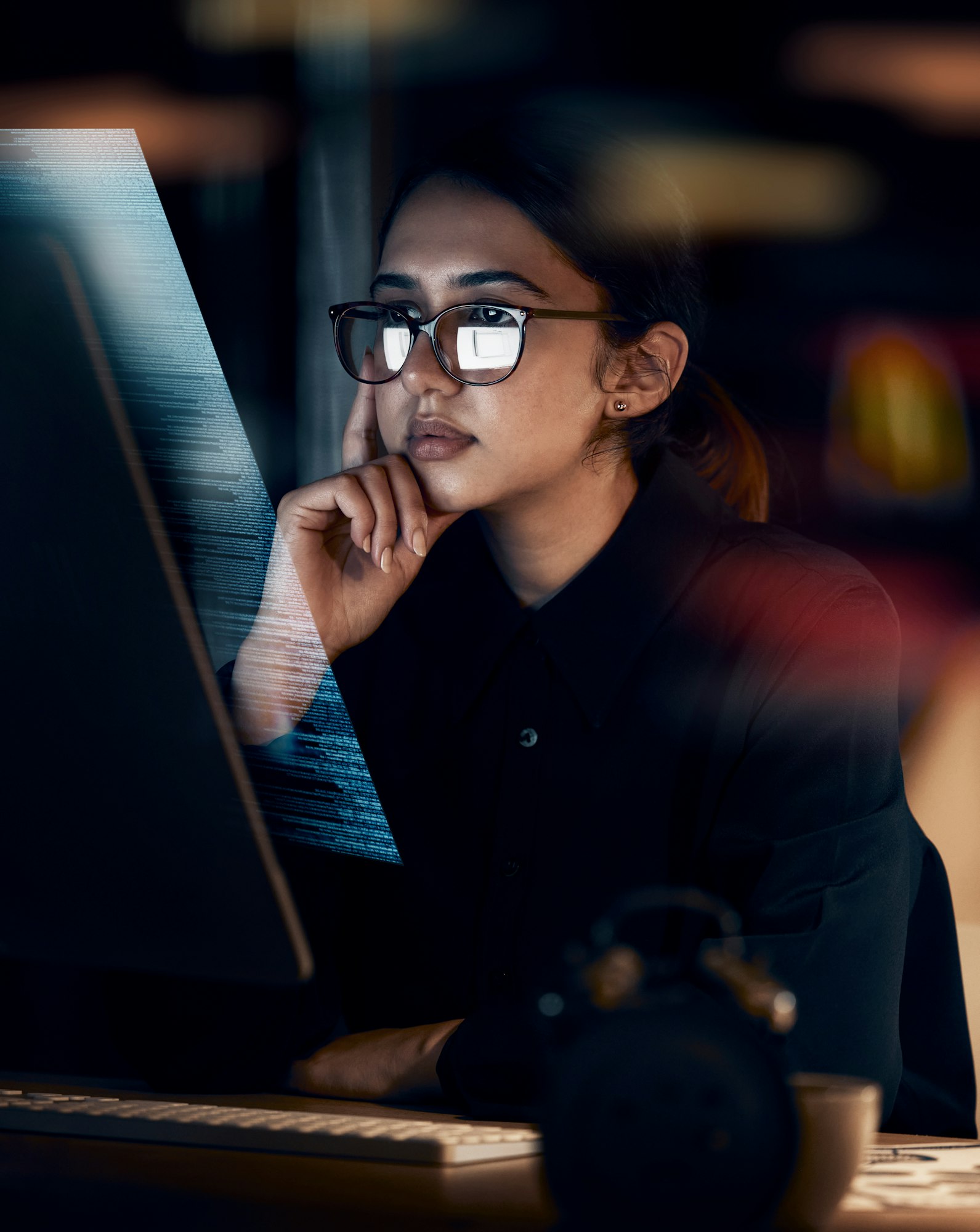 Programming, cybersecurity and thinking with woman at computer for software, idea and coding at nig